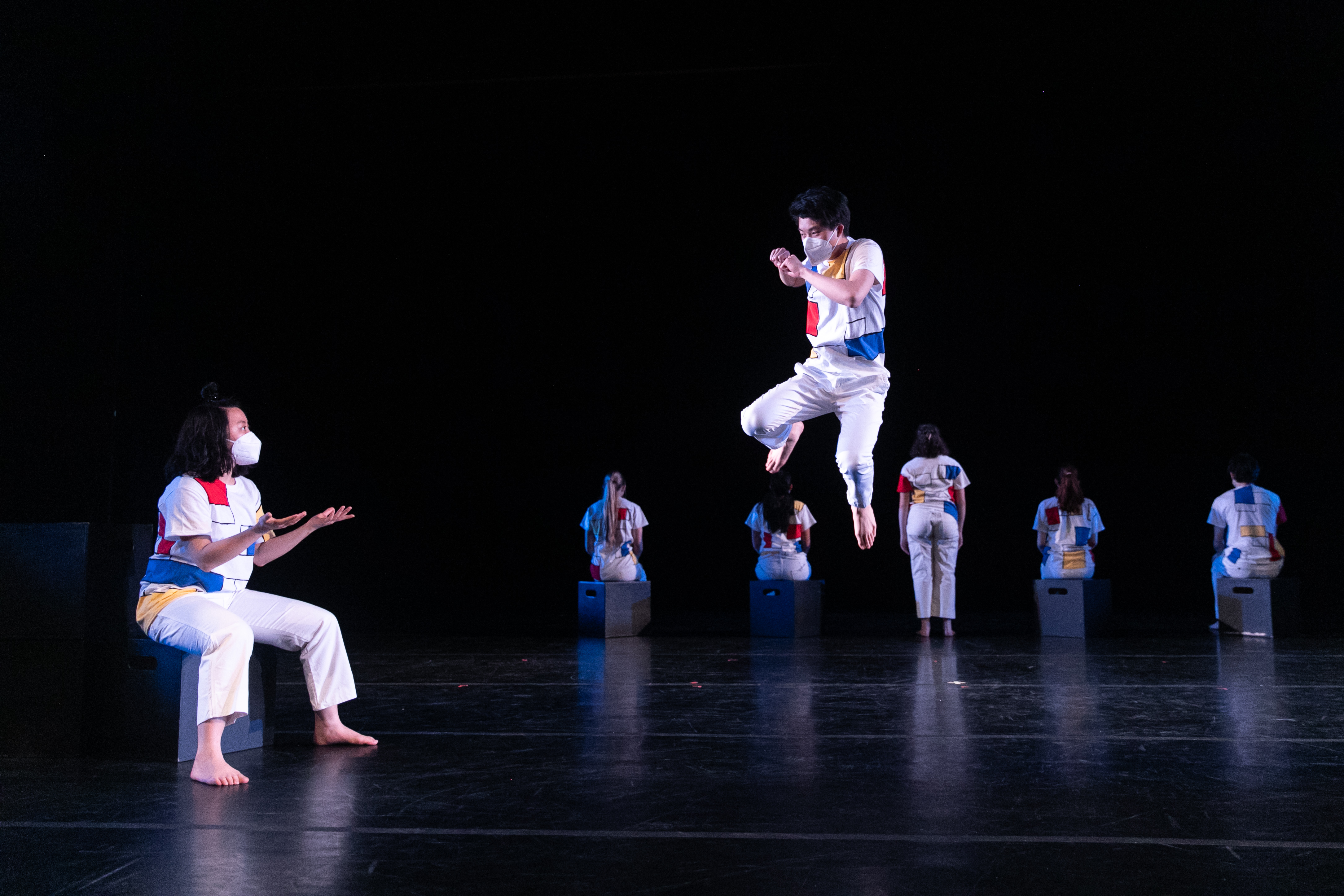 three dancers on a stage